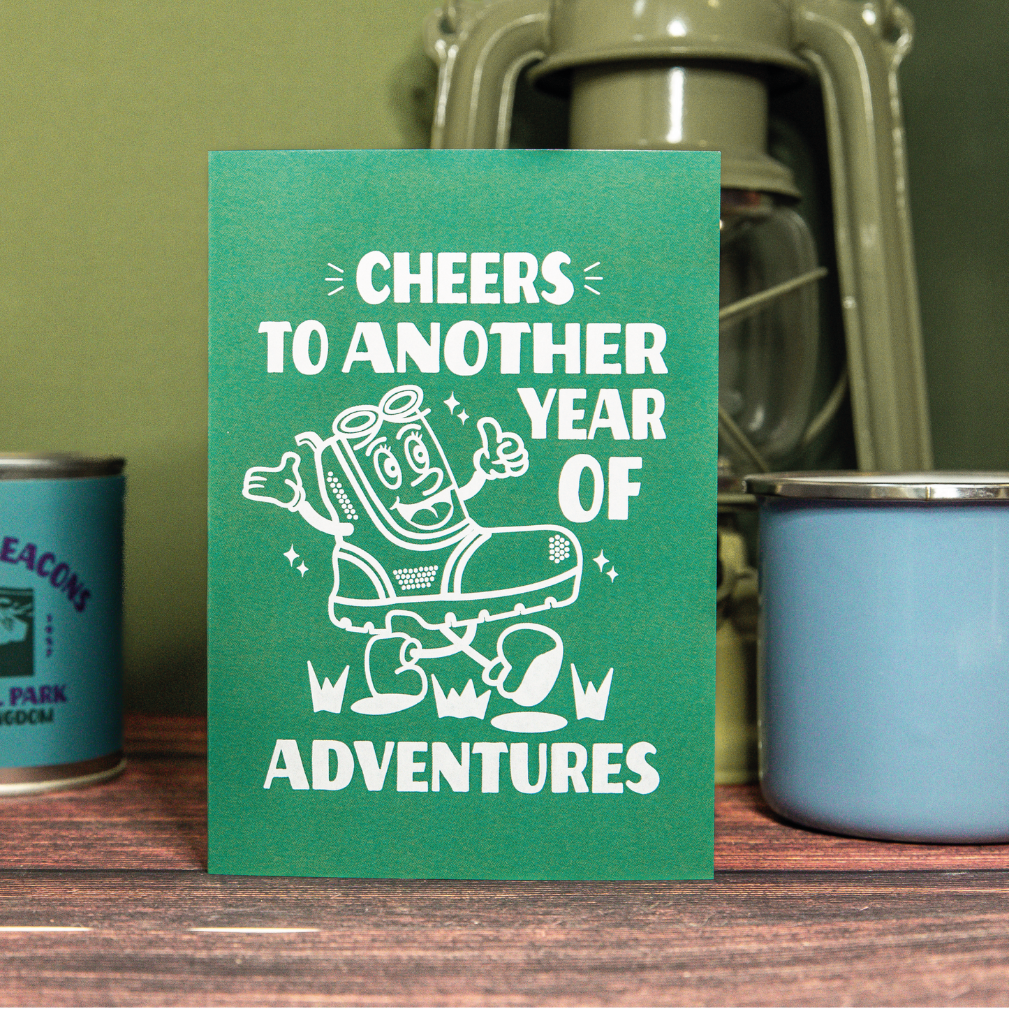 'Cheers to another year of adventures' hiking card